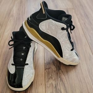 Jordan Black and Gold High-Tops Size 3Y